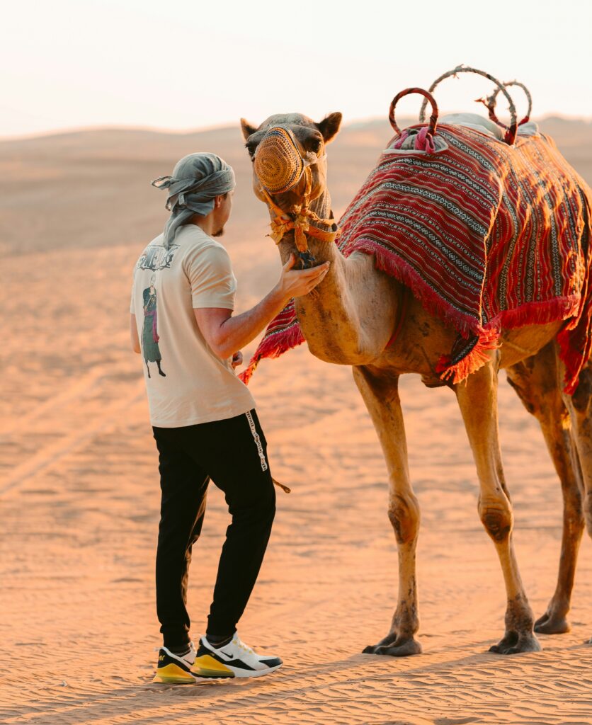A Man with Camel Arabian Tours Dubai