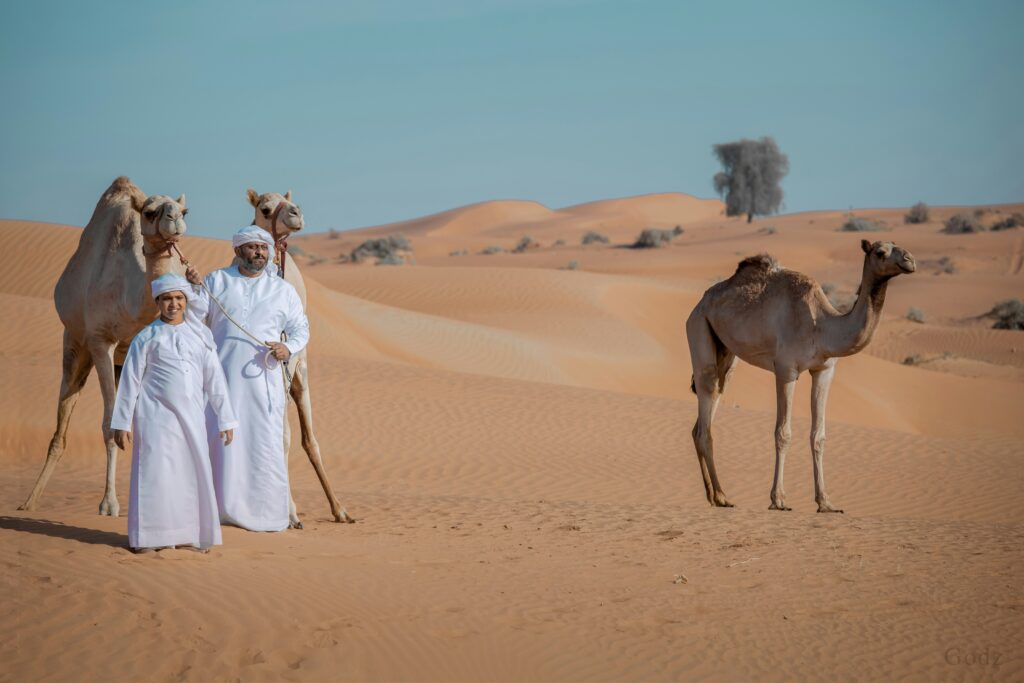 Dubai Safari Park Promo Codes Two Mans With Camels in Dubai Safari Park Promo Codes