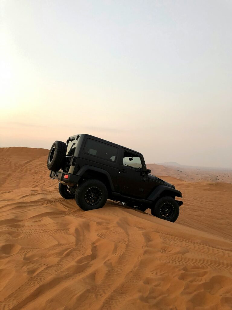 A Black Jeep in Desert Dubai Fun