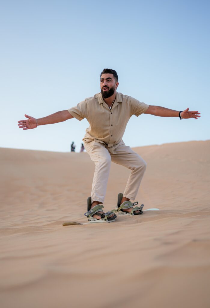 Dubai Desert Photos A Man on Skateboard in Dubai Desert Photos