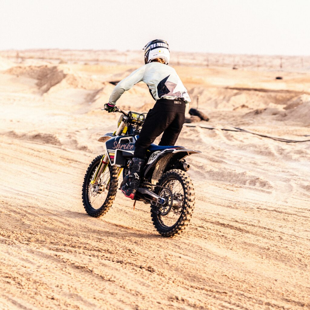 A Man Riding on Bike Hop On Hop Off Dubai