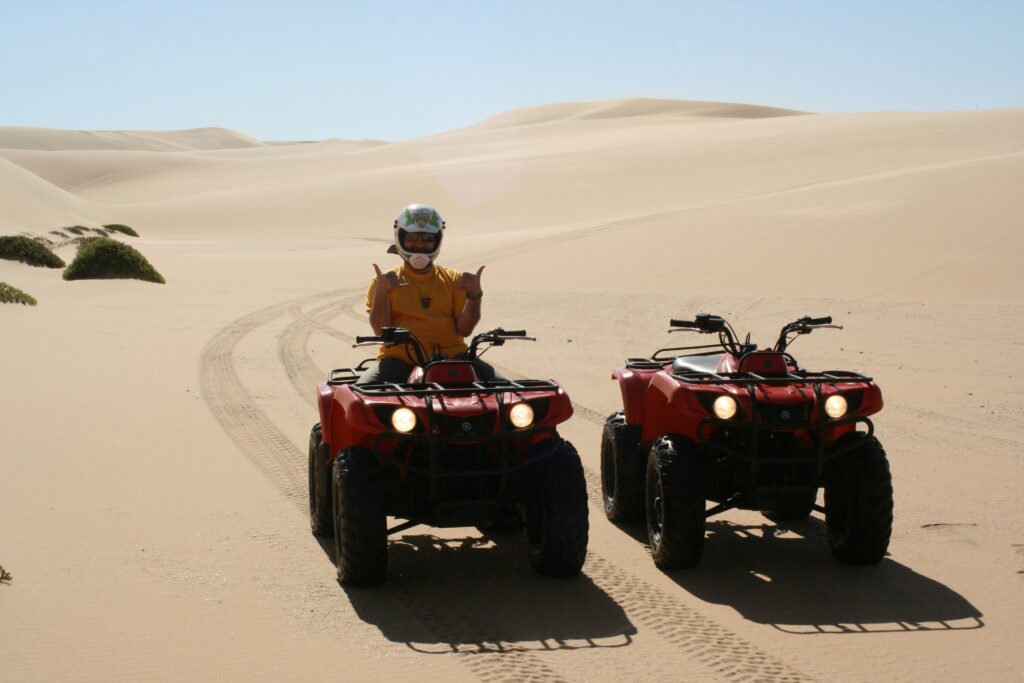 A Man Sit on Buggy Dune Bashing and Dune Buggy Rides in Dubai