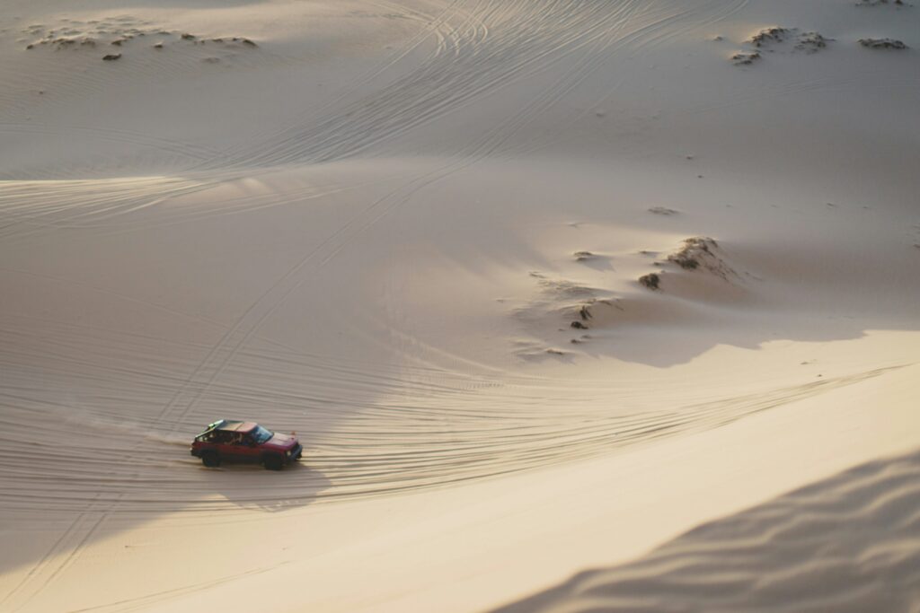 A Four Wheeler Jeep In Dune Bashing Dubai