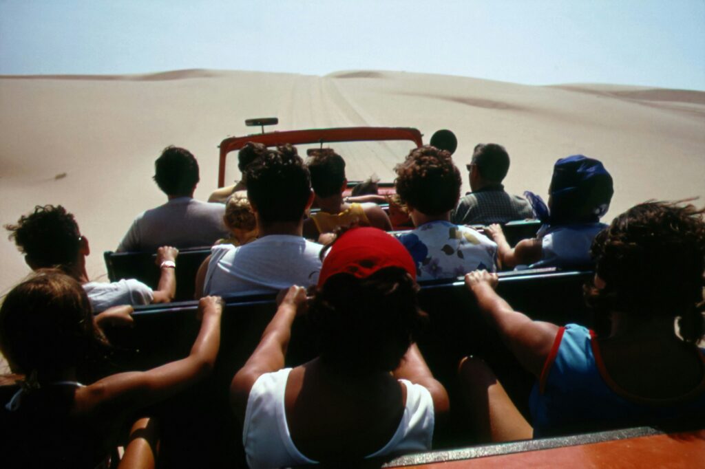 Red Dune Safari Dubai A Tourisr Group on A Jeeep in Red Dune Safari Dubai