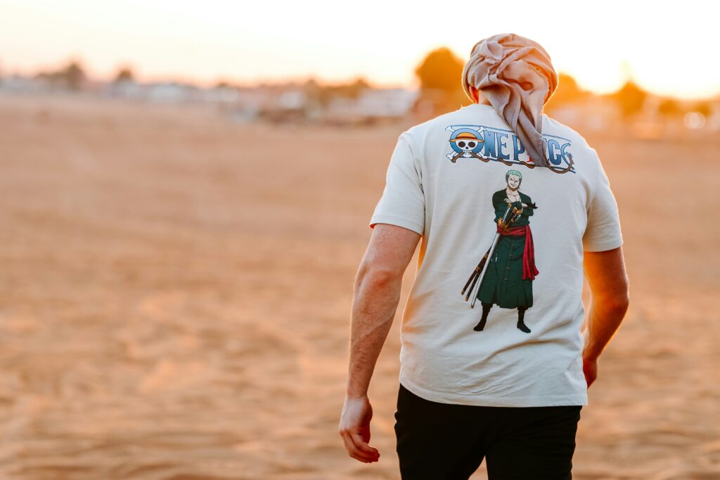 A Person Walking in Desert Sahara Desert Dubai