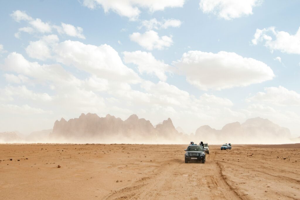 Platinum Heritage Desert Safari Dubai A Group Of Jeeps in Platinum Heritage Desert Safari Dubai