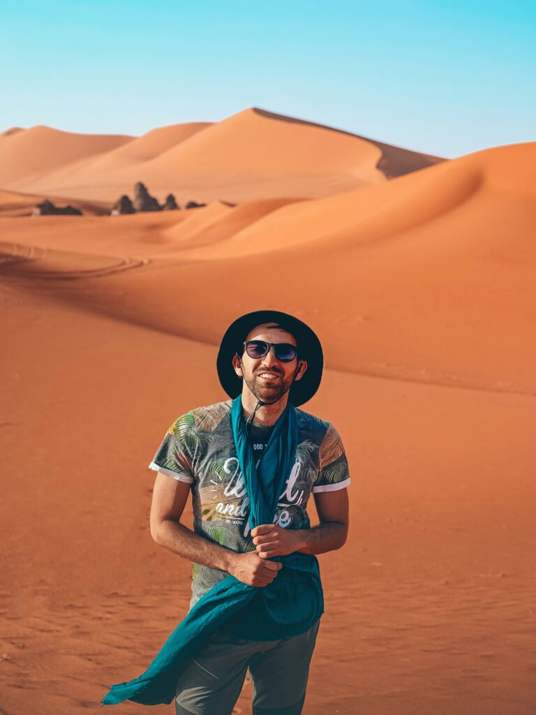 A Touriat Boy Standing in Desert VIP Desert Safari Dubai