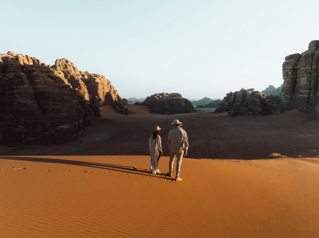 Private Desert Safari in Dubai A Tourist Couple in Desert Private Desert Safari in Dubai