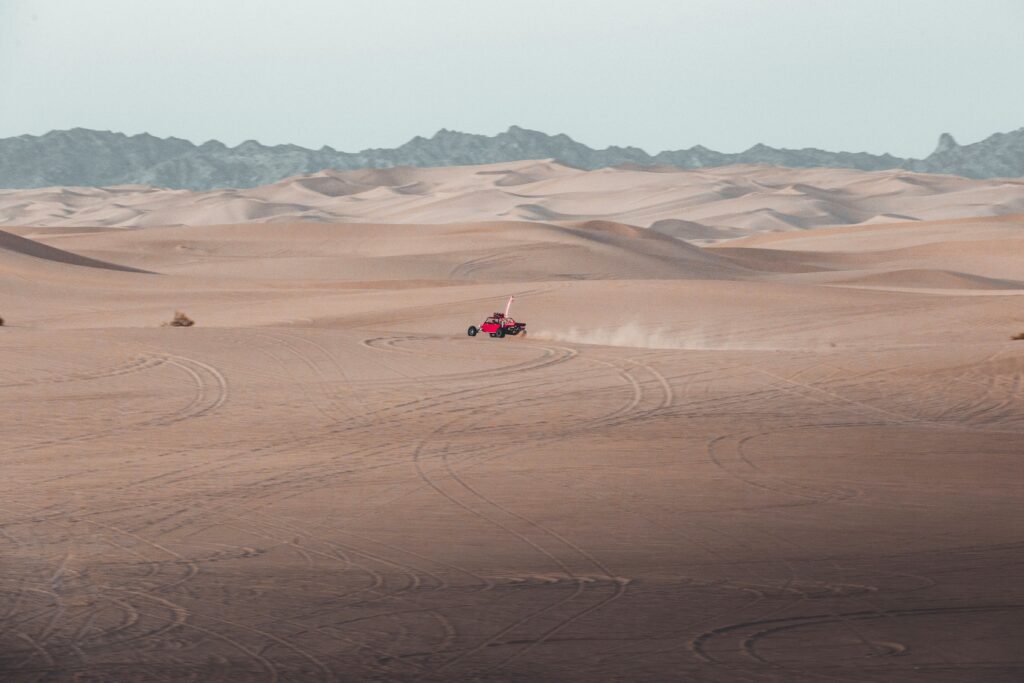 Red Dune Safari Dubai A Red Buggy In Desert Red Dune Safari Dubai