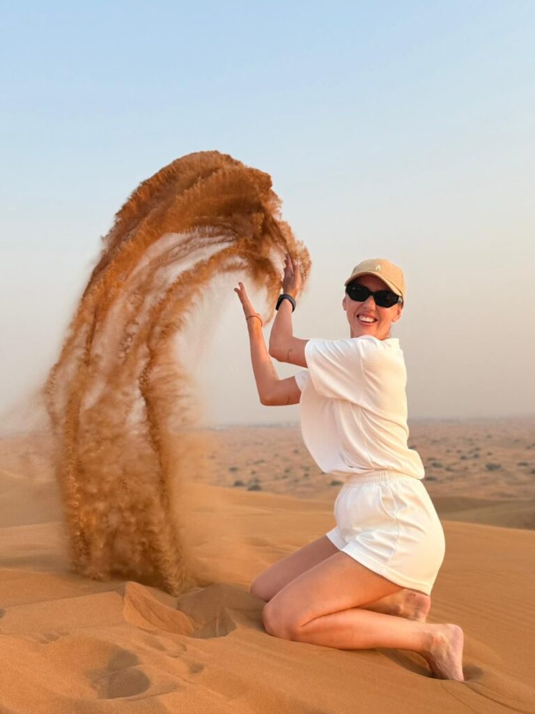 A women playing with sand