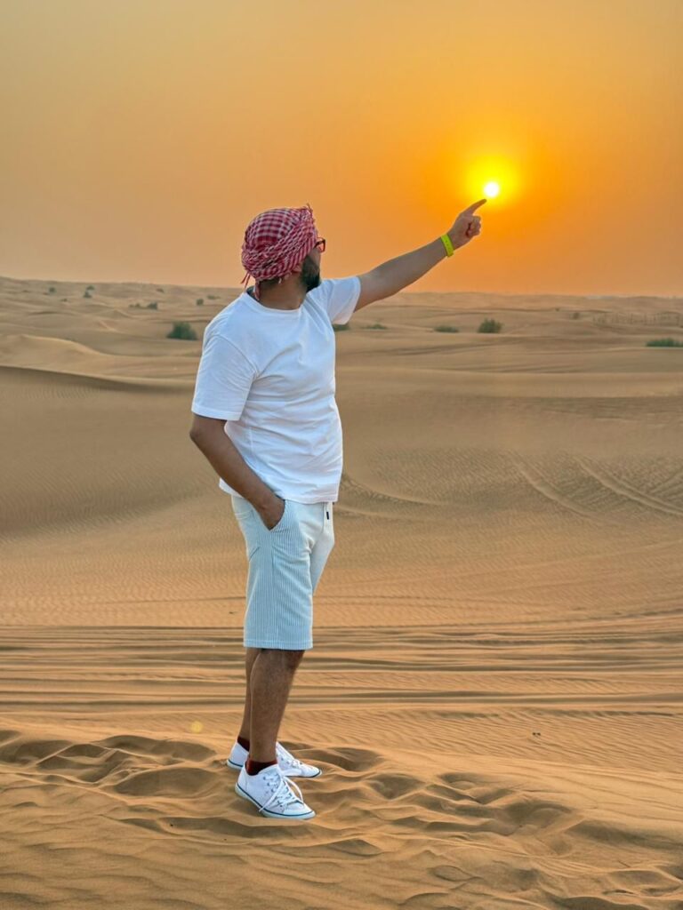 A man Pointing finger towards sun